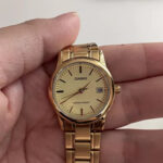 Gold Tone Ladies Date Bracelet Watch